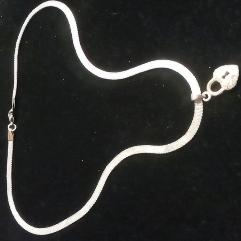 Basket weave chain 22 inches long & heart locket pendant.